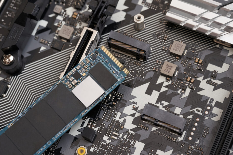 M.2 SSD about to be inserted into motherboard slot